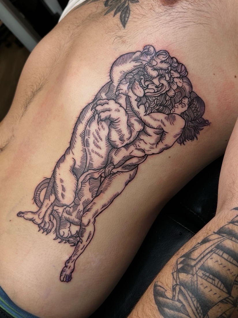 Blackwork lion tattoo
