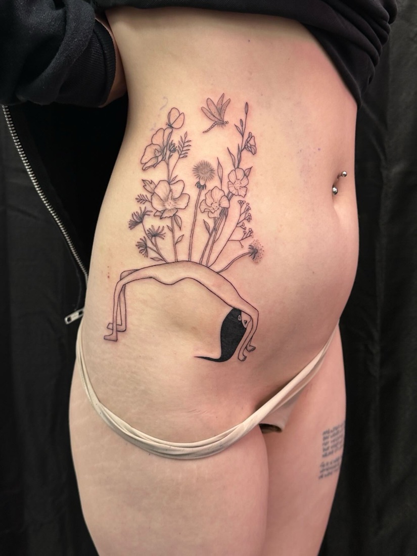 Botanical fine-line tattoo