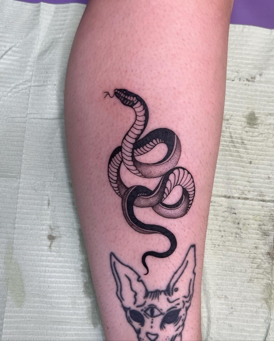 Snake and fox tattoo
